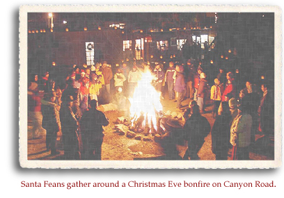 Santa Feans gather around a Christmas Eve bonfire on Canyon Road.