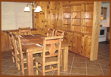 The dining room in this Eagle Newt NM vacation rental home comfortably seats 6 at this beautiful Southwest table and chairs.