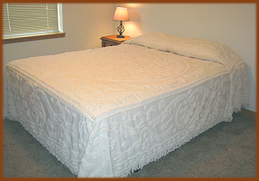 Enjoy peaceful sleeping on this queen sized bed in the quiet nights of Northern New Mexico