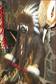You will find beautiful examples of American Indian art at Golden Eagle, like this large warrior figure, embellished with hides, fringe, beads, a feather headdress and war paint.