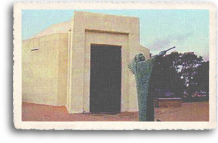 Here is a view of the traditional Navajo hooghan structure that is a part of the Wheelwright Museum of the American Indian located on “museum hill” in Santa Fe, New Mexico.