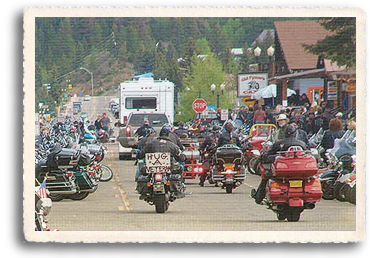 Bikers attending the Red Reiver Memorial Weekend Motorcycle Rally head out from Red River for the Motorcycle Parade to the Vietnam Veterans memorial in Angel Fire, NM